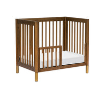 GELATO 4-IN-1 CONVERTIBLE MINI CRIB - NATURAL WALNUT AND GOLD FEET