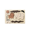 A wooden tray puzzle with pieces cut out in shapes of animals and a vehicle, arranged on a flat surface.